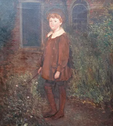 Portrait of a Young Boy in a Garden